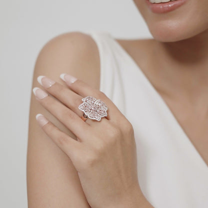 18kt rose gold ring with round-shaped white diamonds and mixed fancy-shaped natural pink diamonds