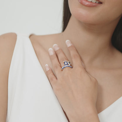 14kt yellow gold ring with round and pear-shaped diamonds and pear-shaped blue sapphire