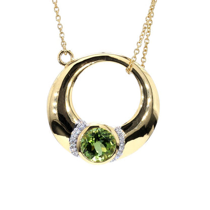 14kt yellow gold pendant with round-shaped green tourmaline and pave diamonds